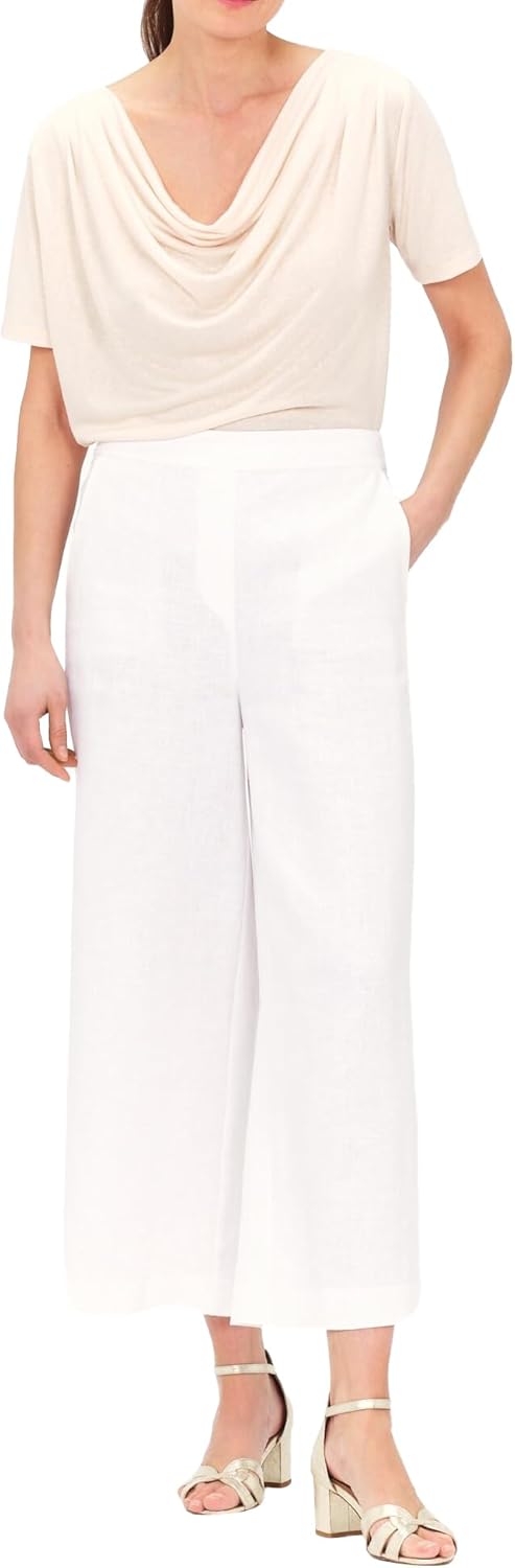 Pavo Monitor Arm attached to a modern office desk