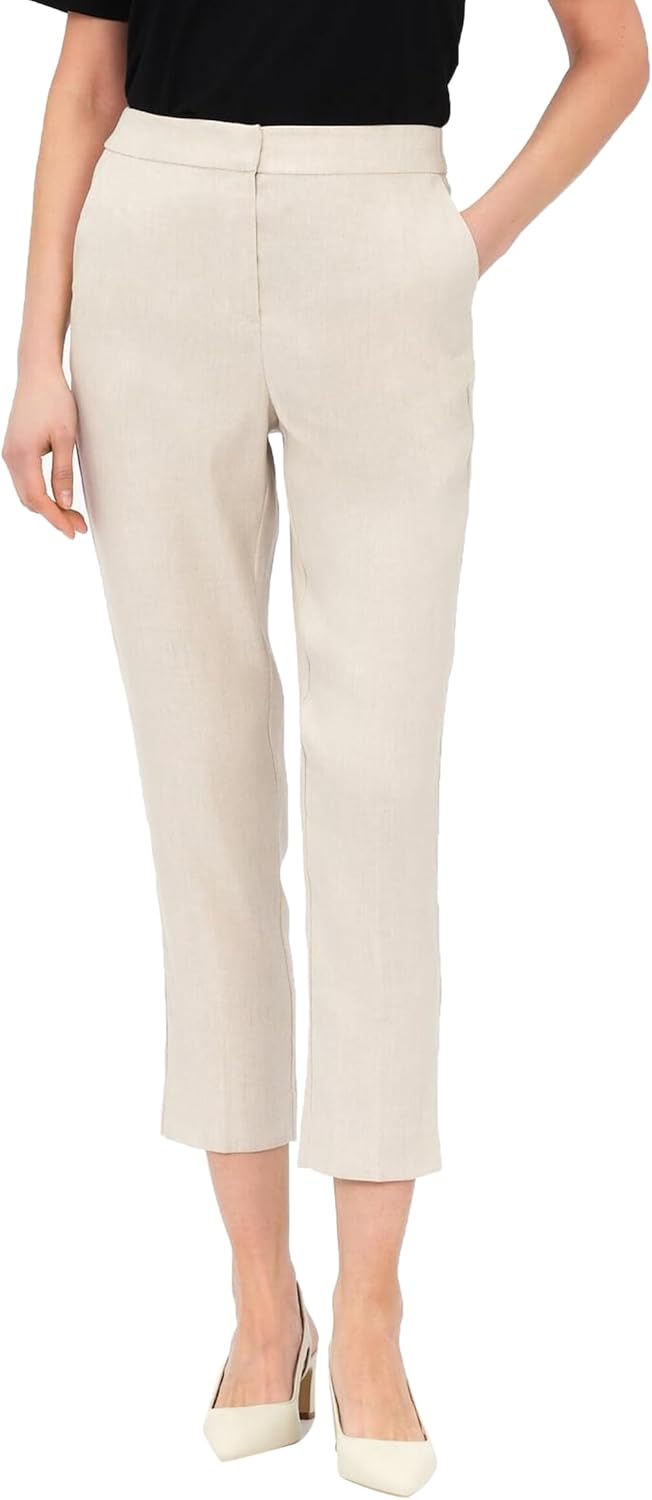 Pavo Monitor Arm installed on a wooden desk with adjustable height